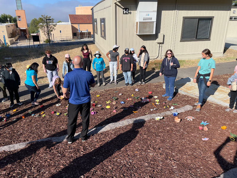 Students Surr the Flowers